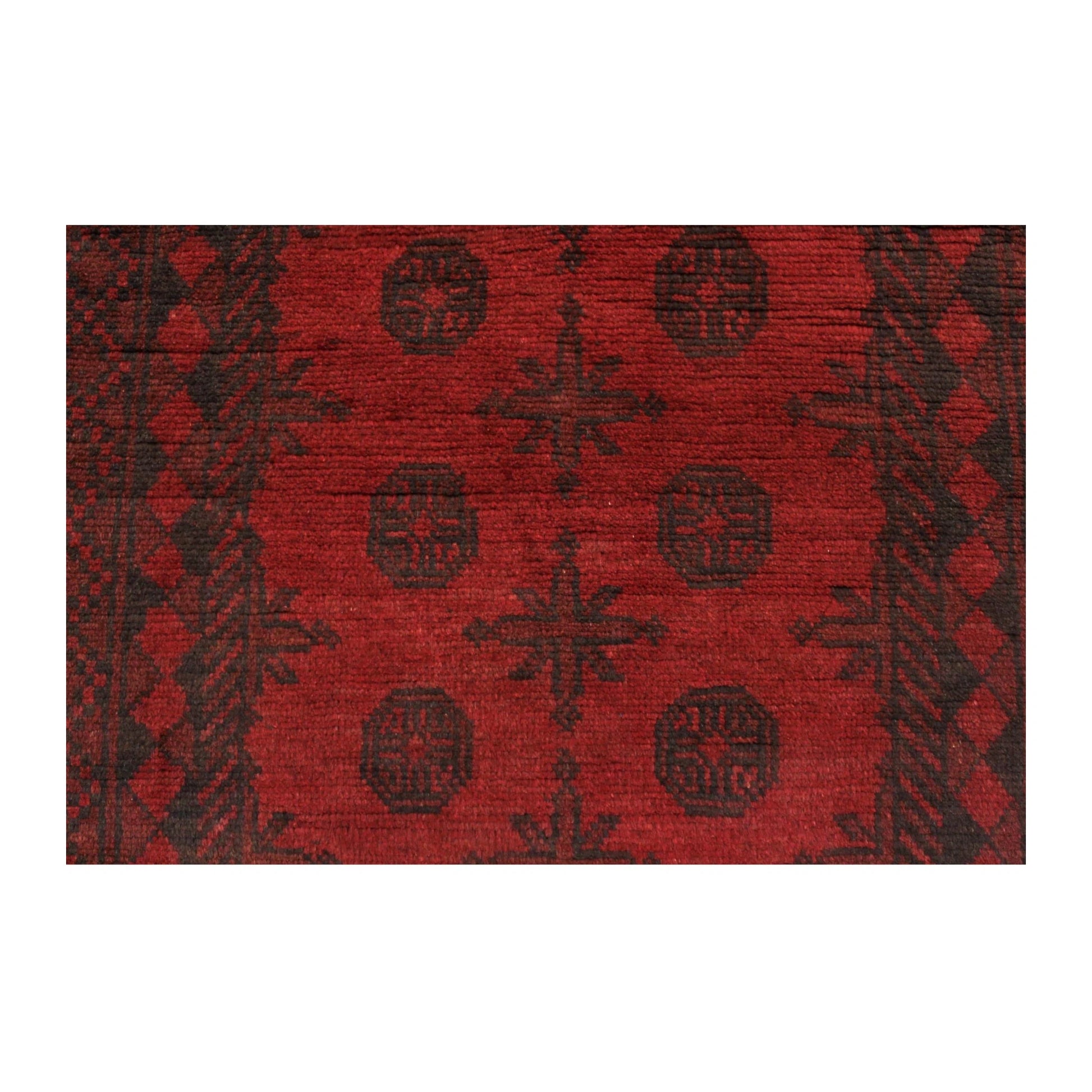 Field detail of Afghan Turkoman wool rug showing repeating tribal motifs, 197 x 92 cm