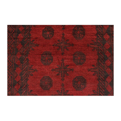 Field detail of Afghan Turkoman wool rug showing repeating tribal motifs, 197 x 92 cm