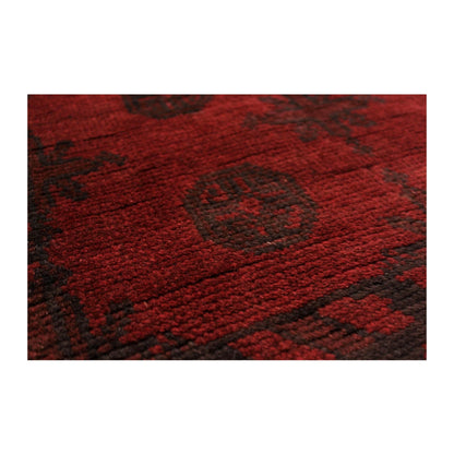 Gul motif detail of Afghan Turkoman wool rug in deep red and charcoal tones, 197 x 92 cm