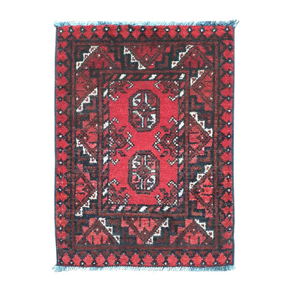 Afghan Turkoman wool rug 62 x 48 cm full view with red field, dark border and twin octagonal gul medallions