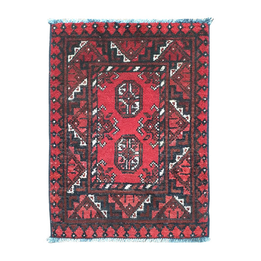 Afghan Turkoman wool rug 62 x 48 cm full view with red field, dark border and twin octagonal gul medallions
