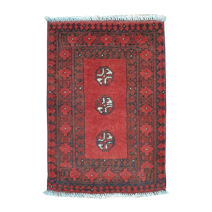 Afghan Turkoman wool rug 70 x 52 cm full view with open red field, three quartered guls and broad tribal borders