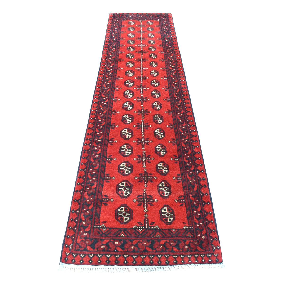 Full view of Afghan Turkoman hand-knotted wool runner with deep red field, repeating oval guls and dark geometric borders, 236 x 64 cm