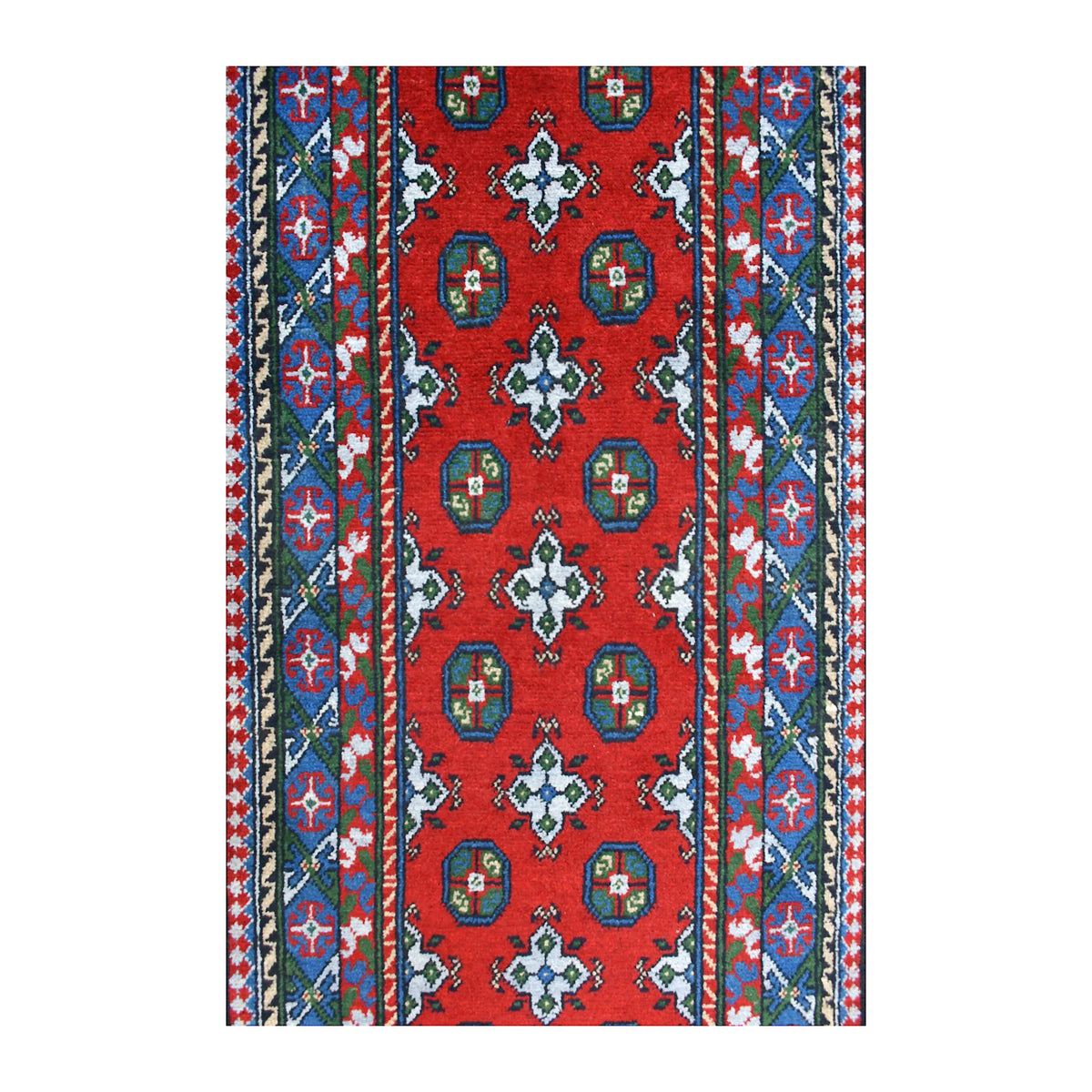 Field detail of Afghan Turkoman wool runner showing paired blue guls, ivory star-like forms and jewel-toned geometric borders