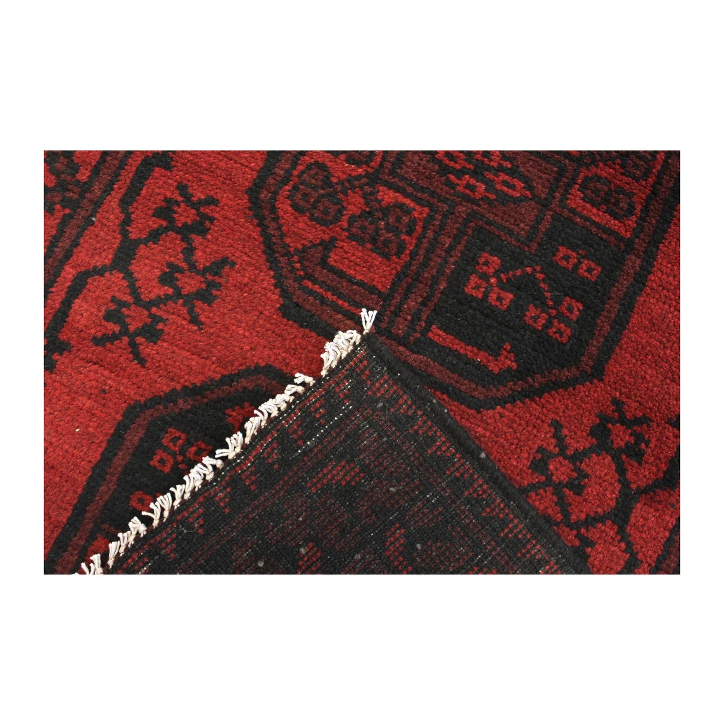 Folded-corner detail of Afghan Turkoman runner rug showing fringe and reverse weave, 280 x 79 cm