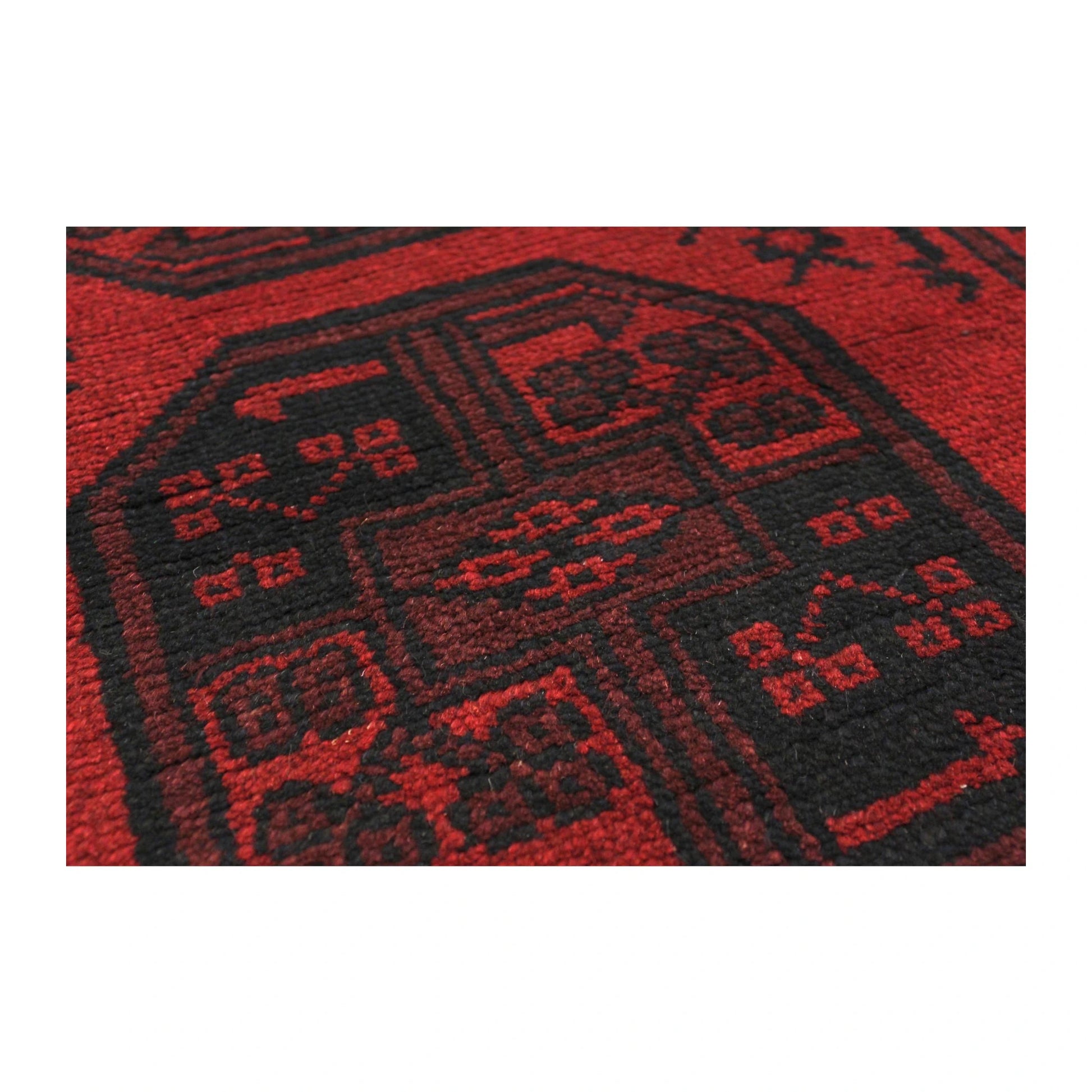 Gul motif detail of Afghan Turkoman wool runner rug in deep red tones, 280 x 79 cm