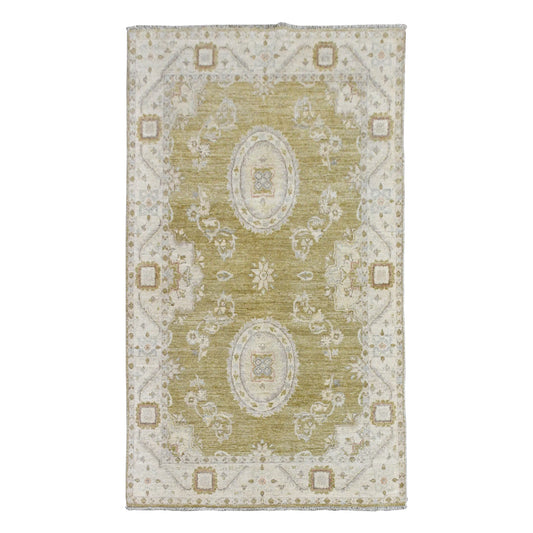Full view of Afghan Ziegler hand-knotted wool rug with olive-beige field and twin ivory floral medallions, 200 x 123 cm
