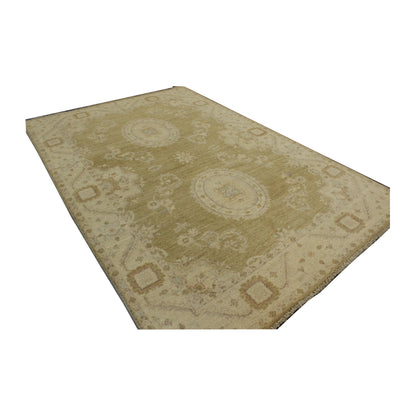 Floor view of Afghan Ziegler wool rug showing muted floral pattern, 200 x 123 cm