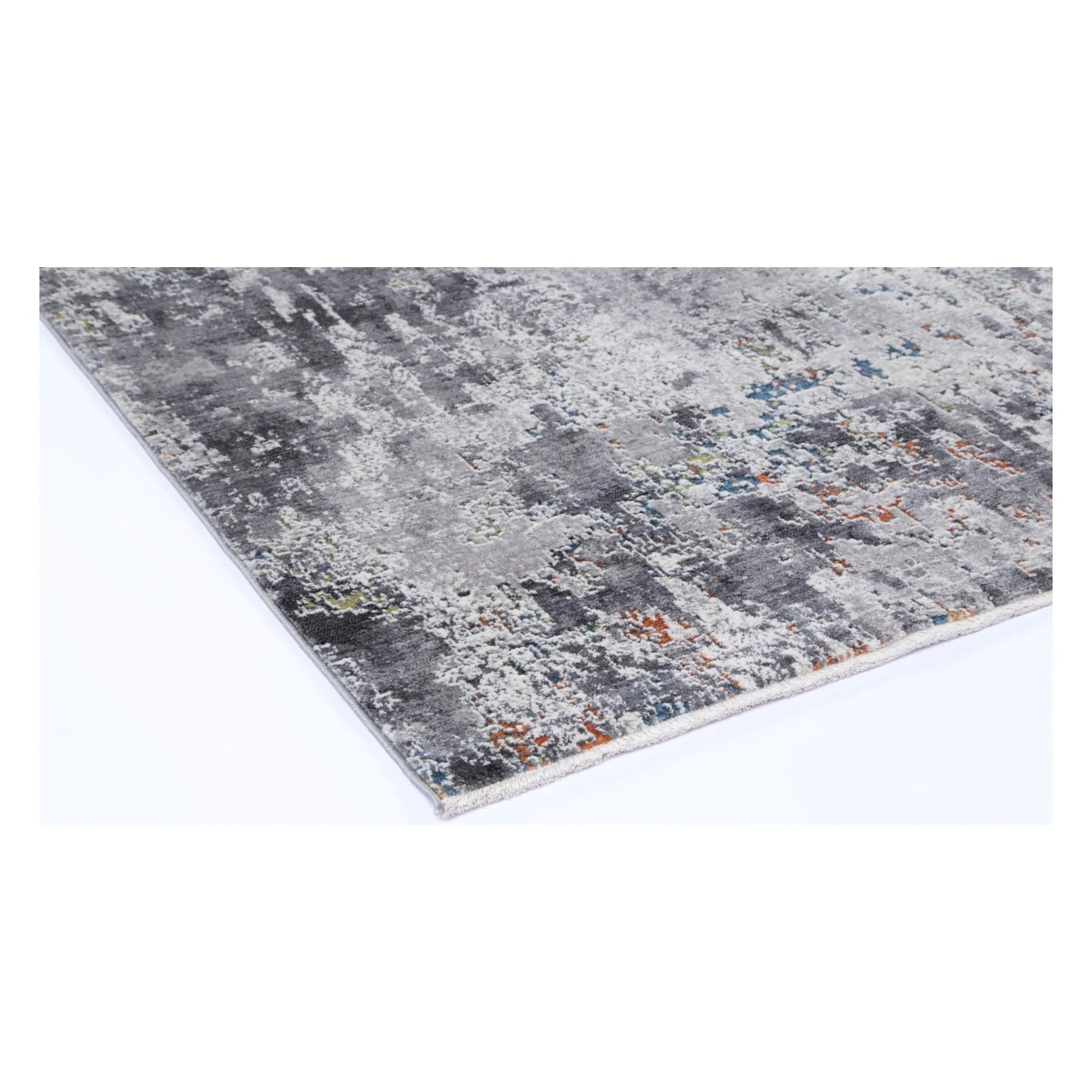 Corner detail of Almeras A4 grey abstract rug with layered grey pattern