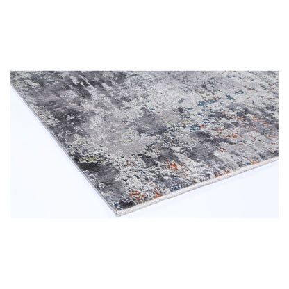 Corner detail of Almeras A4 grey abstract rug with layered grey pattern