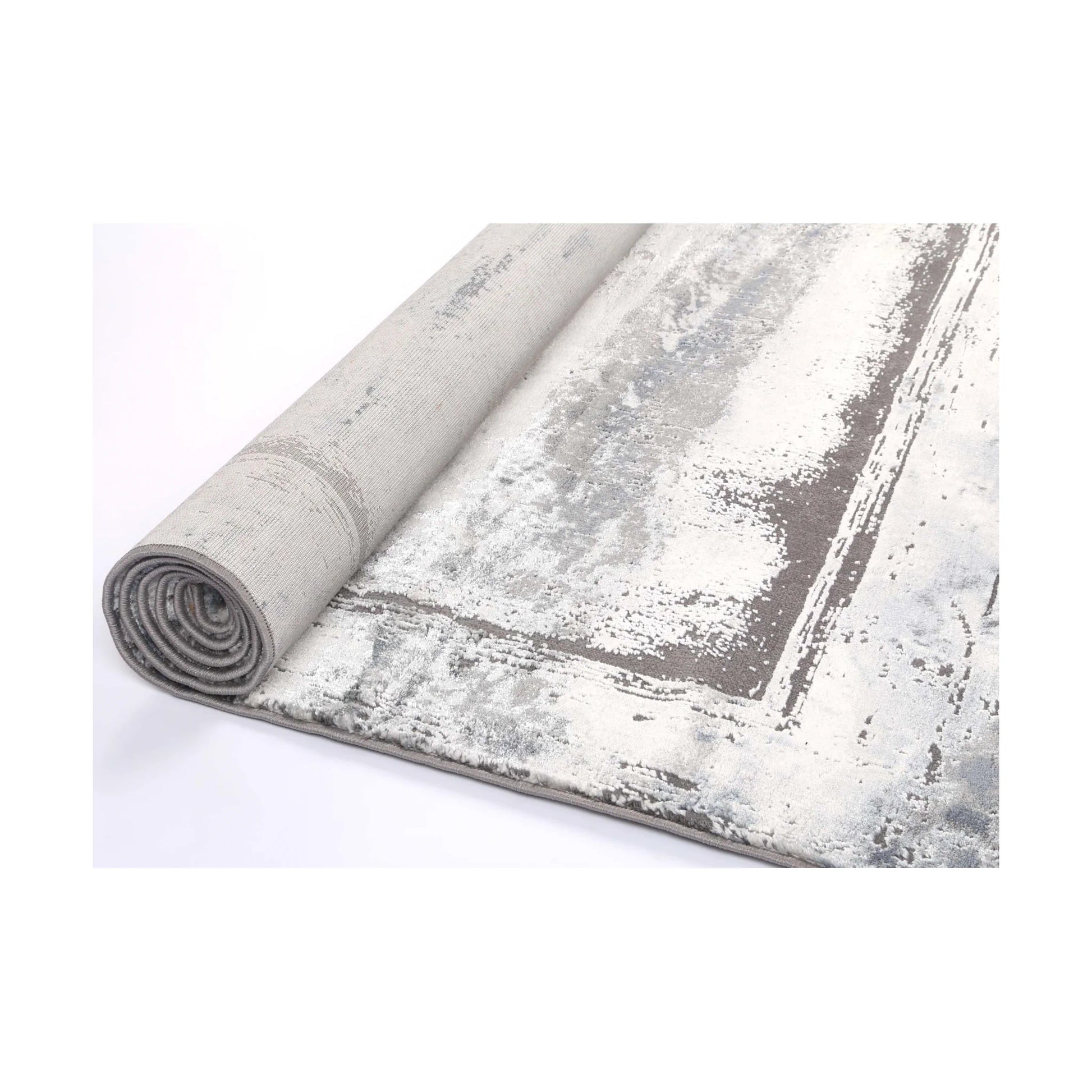 Rolled edge detail of Antep 23314 Grey modern rug showing backing, binding and patterned polypropylene pile, 230 x 160 cm