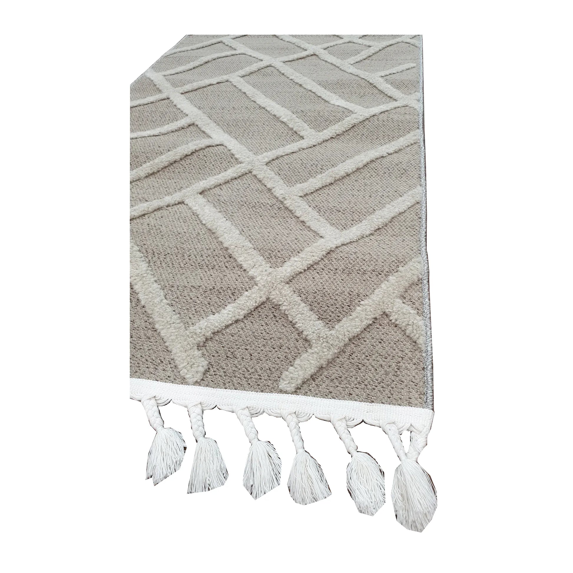 Tassel edge detail of Archer Beige Runner Rug showing beige textured surface and raised ivory geometric lines