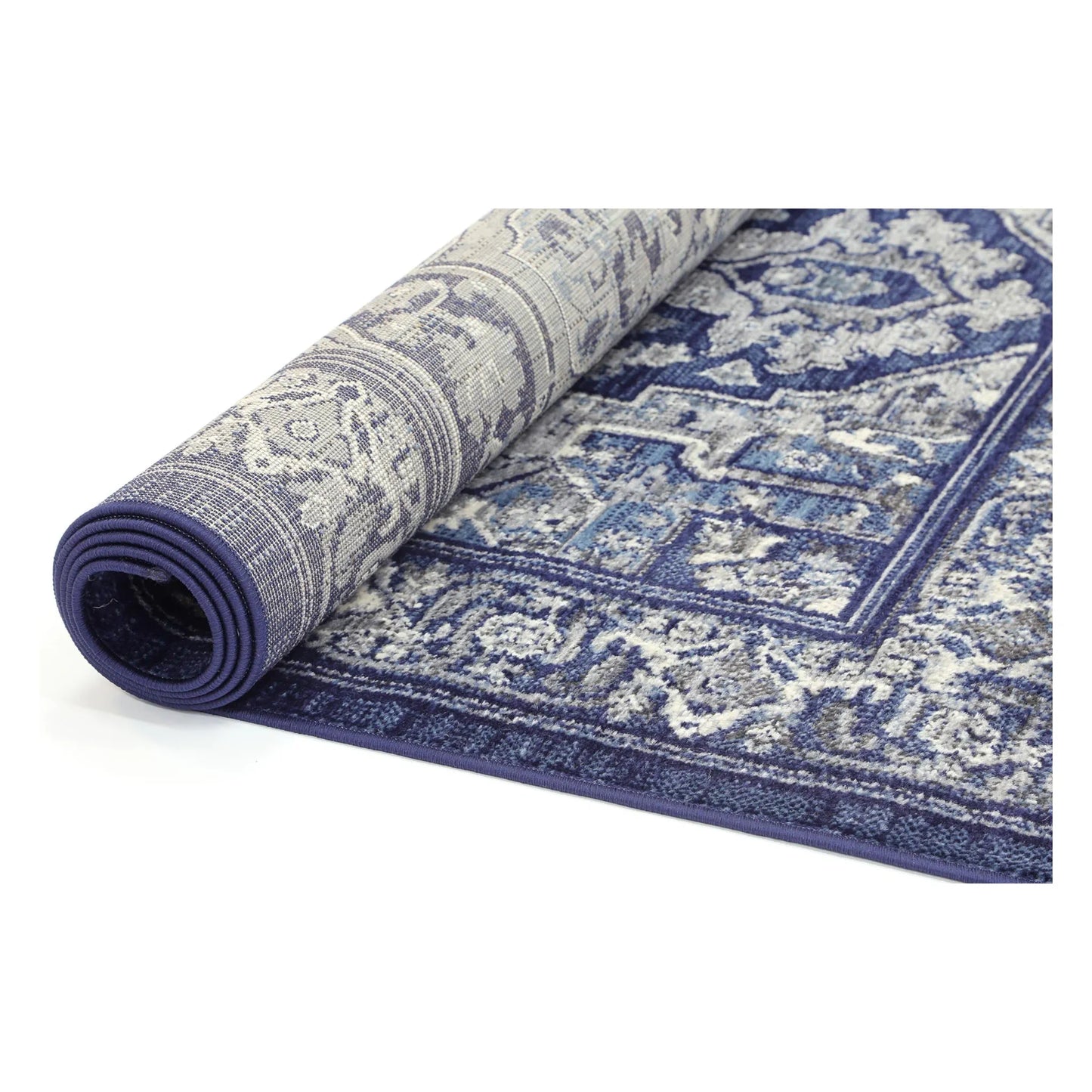 Rolled view of Arya navy traditional rug showing surface pattern and backing