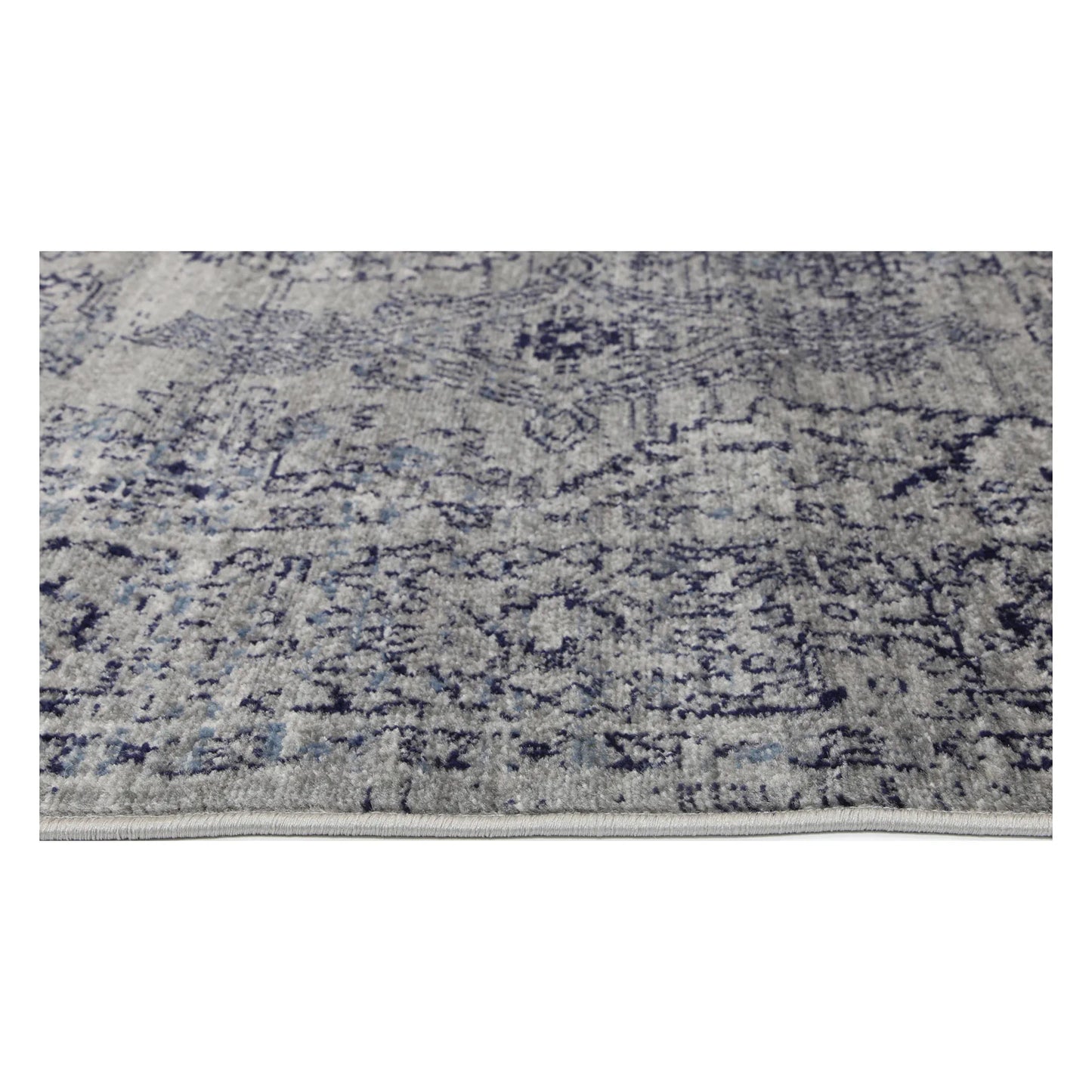 Border texture detail of Arya charcoal traditional rug showing grey ornamental pattern