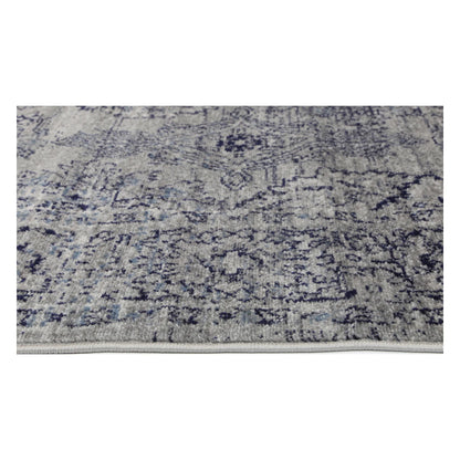 Border texture detail of Arya charcoal traditional rug showing grey ornamental pattern