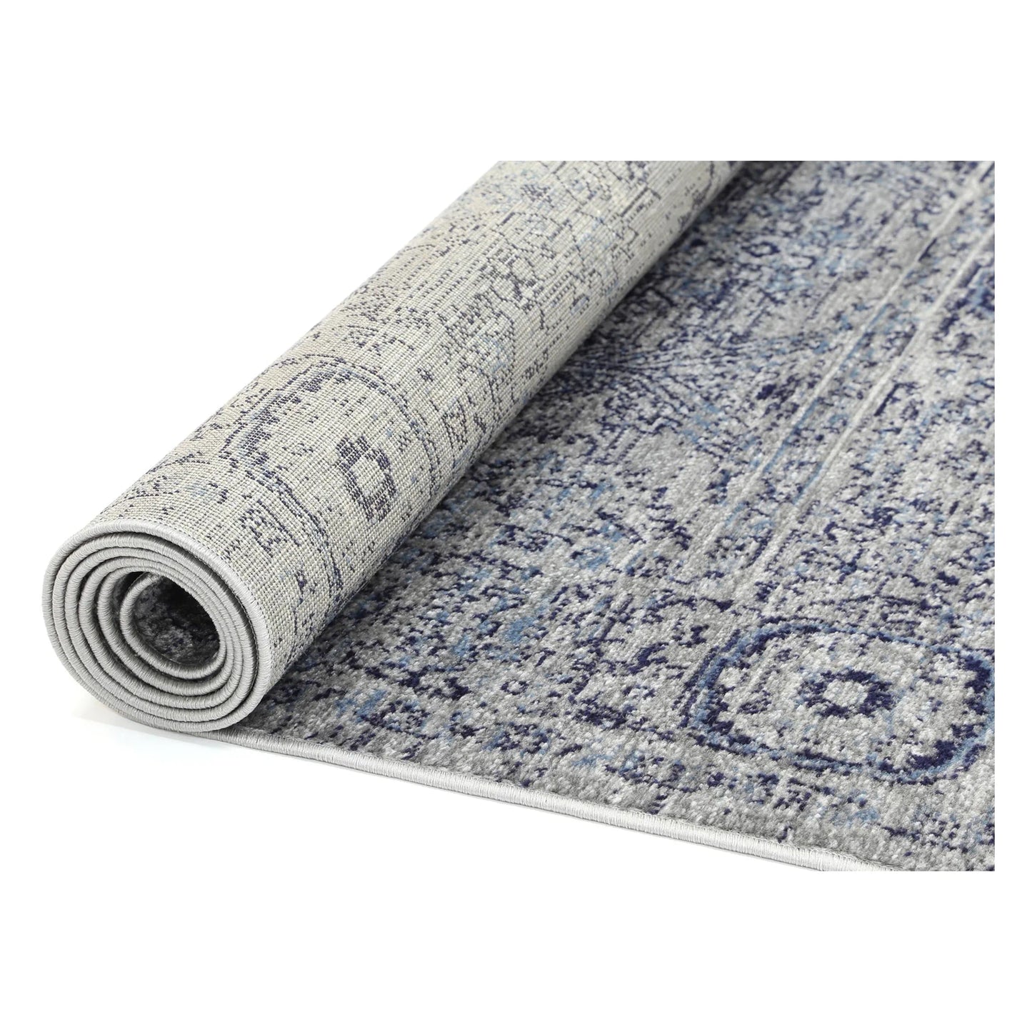 Rolled view of Arya charcoal traditional rug showing surface pattern and backing