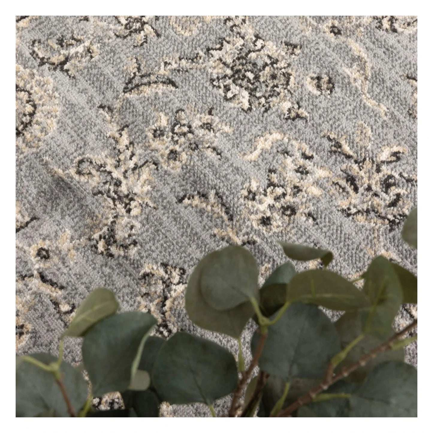 Close-up of Arya grey traditional floral rug showing floral pattern detail