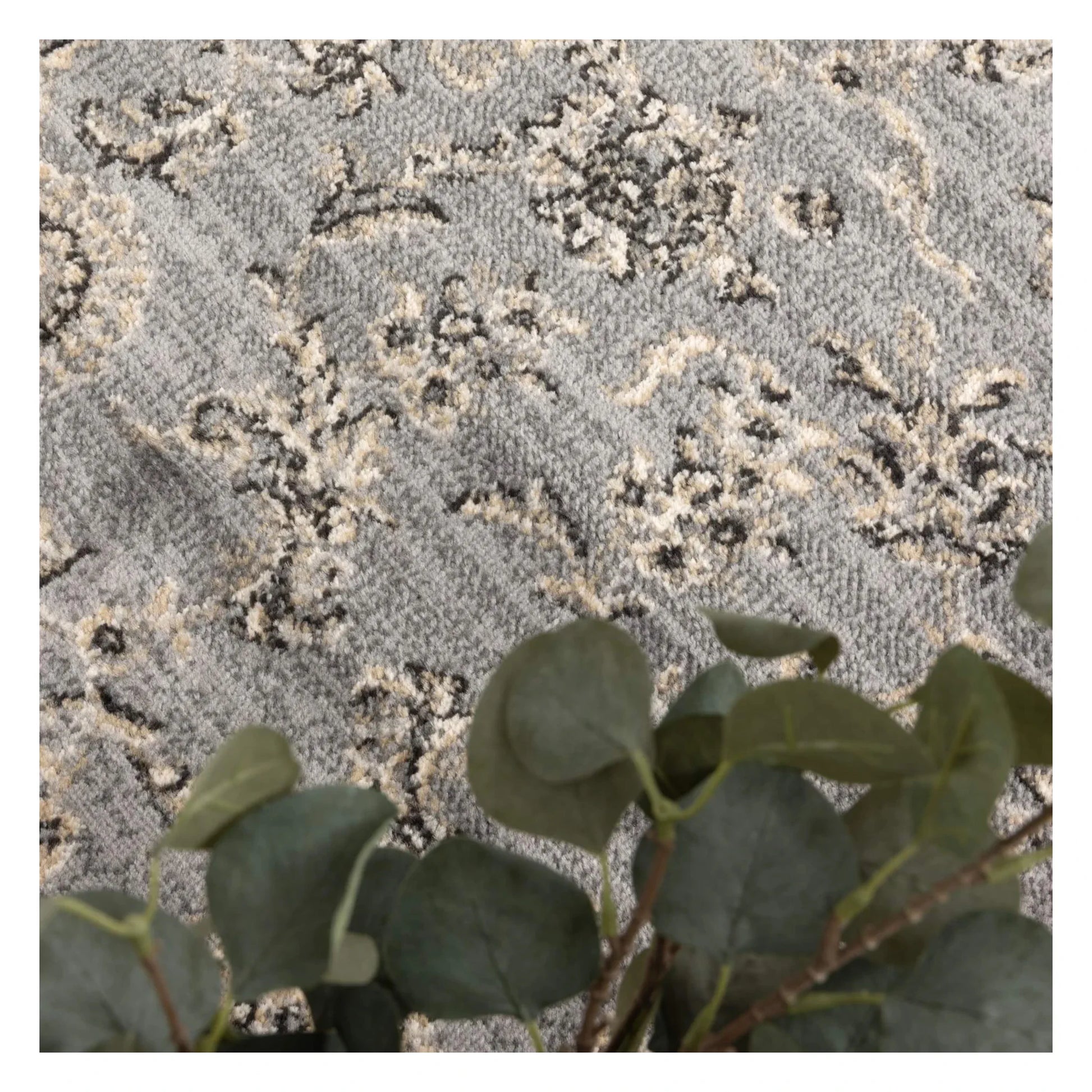 Close-up of Arya grey traditional floral rug showing floral pattern detail