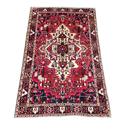 Bakhtiari rug 315 x 205 cm angled view multi panel geometric pattern