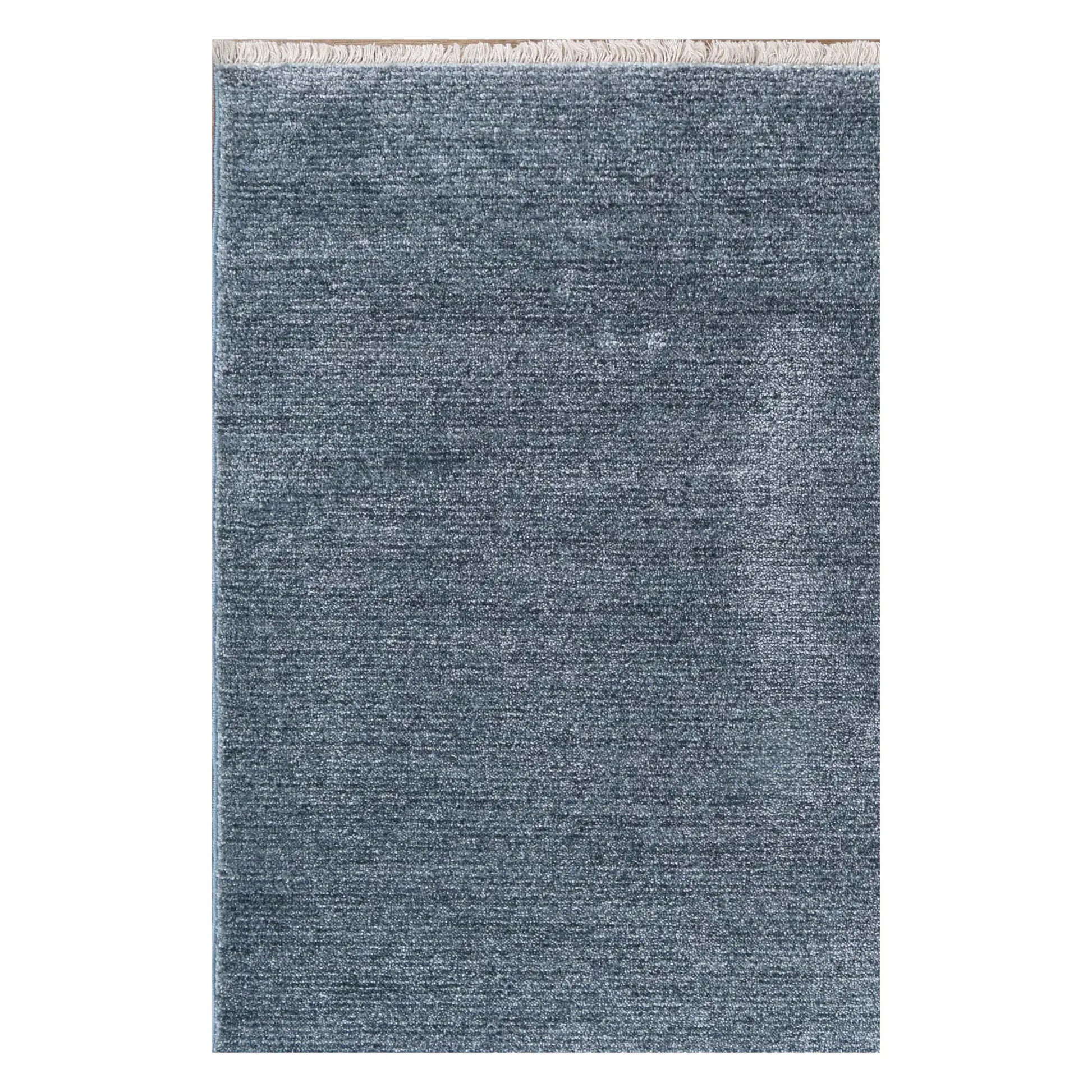 Texture detail of Baltimore Chobi Ocean grey rug showing blue-grey tonal variation