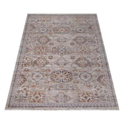 Angled full view of Baltimore Upton vintage inspired rug showing soft grey and rose pattern