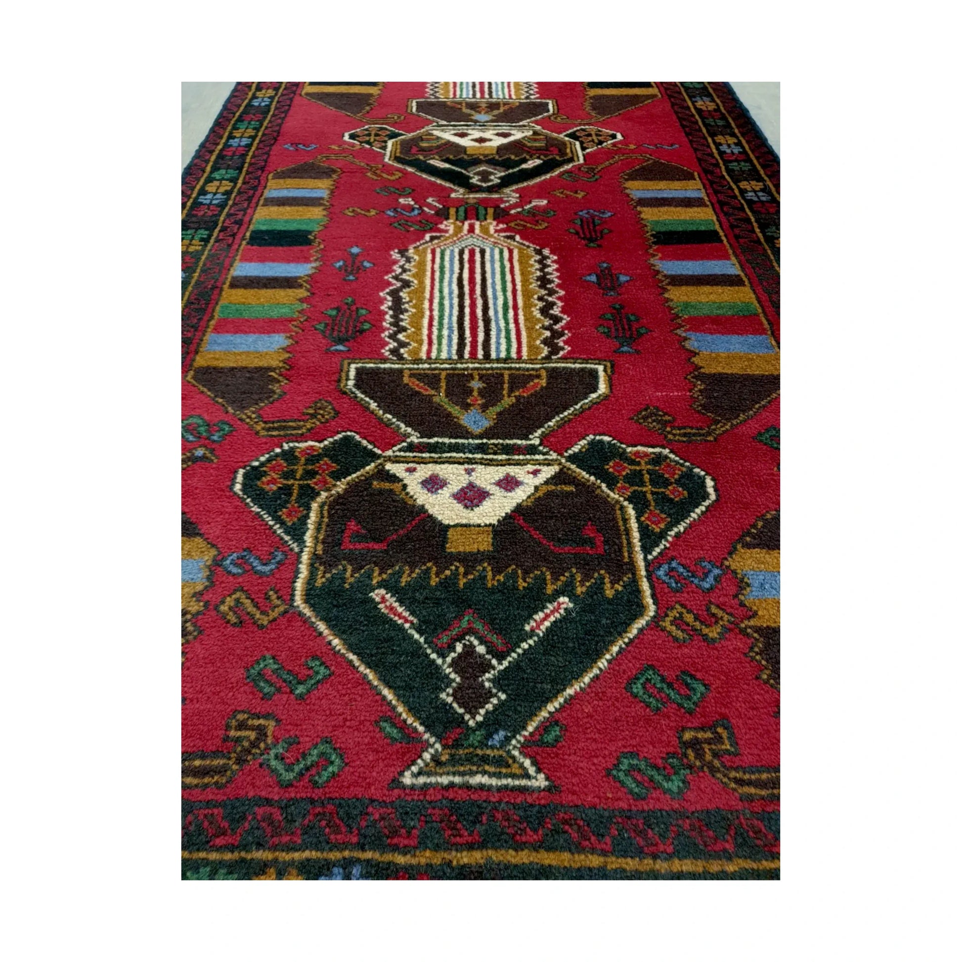 Baluchi fine hand-knotted wool rug central motif detail