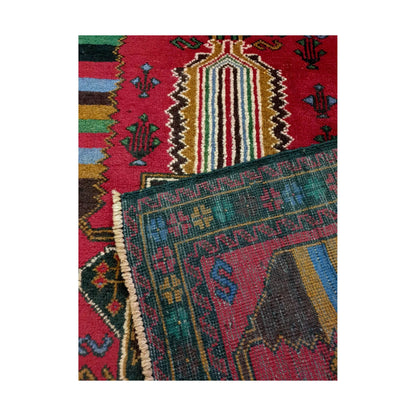 Baluchi fine hand-knotted wool rug folded corner detail