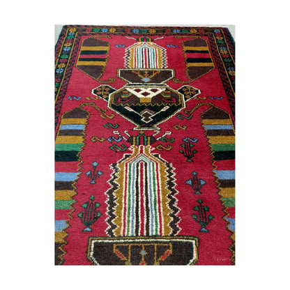 Baluchi fine hand-knotted wool rug top motif detail