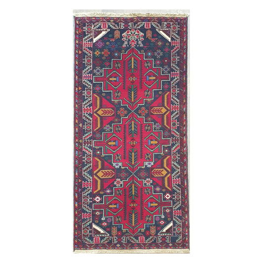 Full view of Baluchi hand-knotted runner rug with bold tribal geometric pattern, 200 x 83 cm