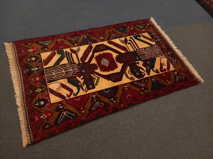 Baluchi hand-knotted wool rug 184 x 113 cm angle view