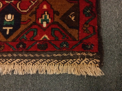 Baluchi rug border and fringe detail