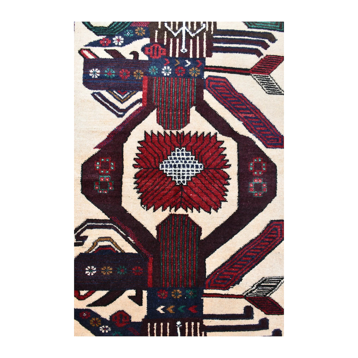 Central medallion detail of Baluchi rug with surrounding black, brown and beige geometric forms