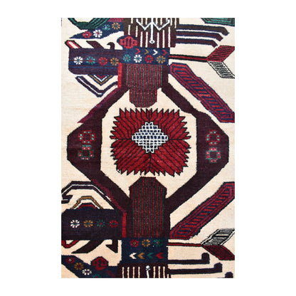 Central medallion detail of Baluchi rug with surrounding black, brown and beige geometric forms