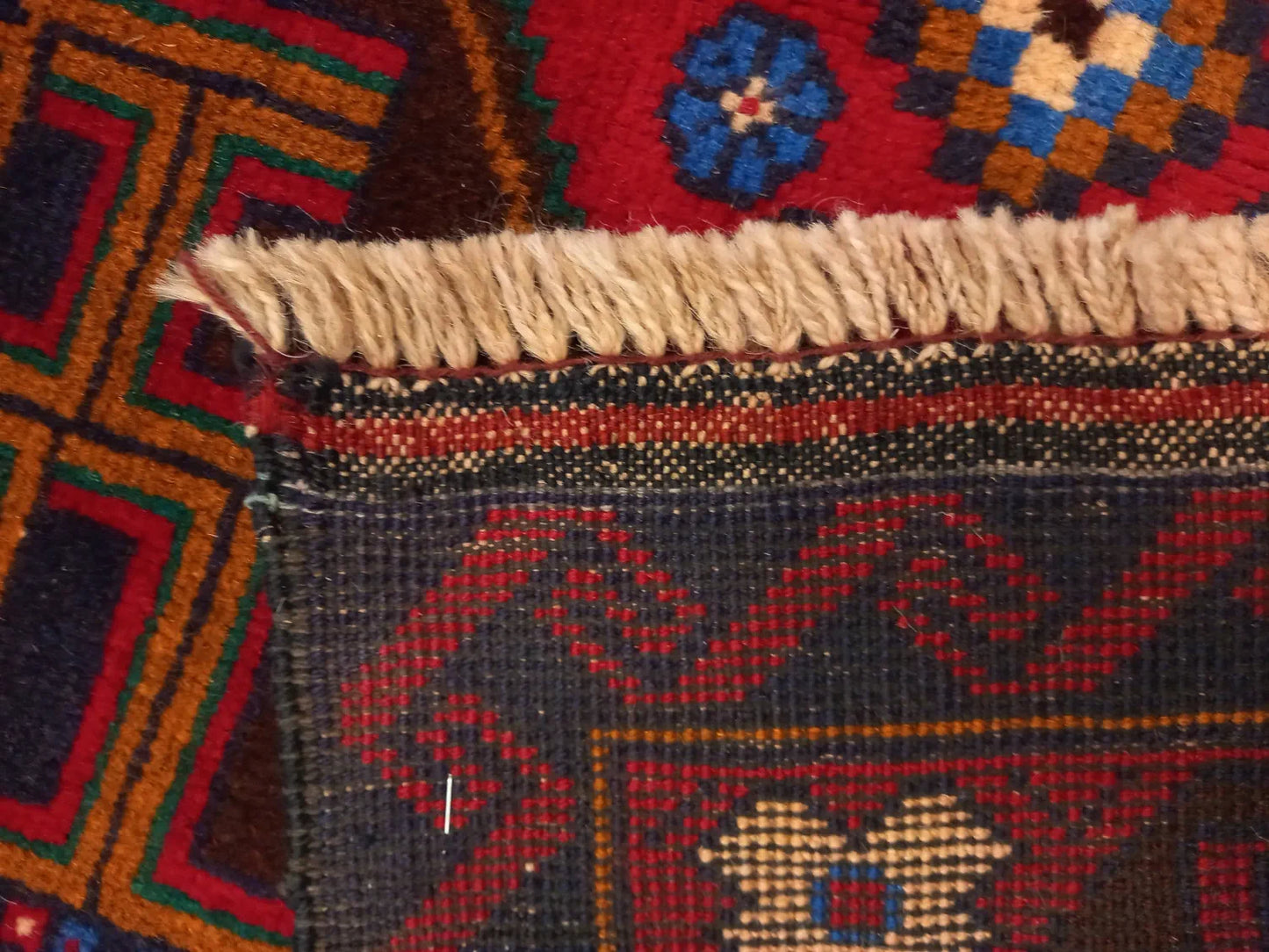 Baluchi hand-knotted wool rug 190 x 102 cm close pattern detail
