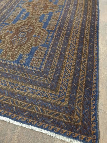 Baluchi hand-knotted wool rug 196 x 115 cm angled view