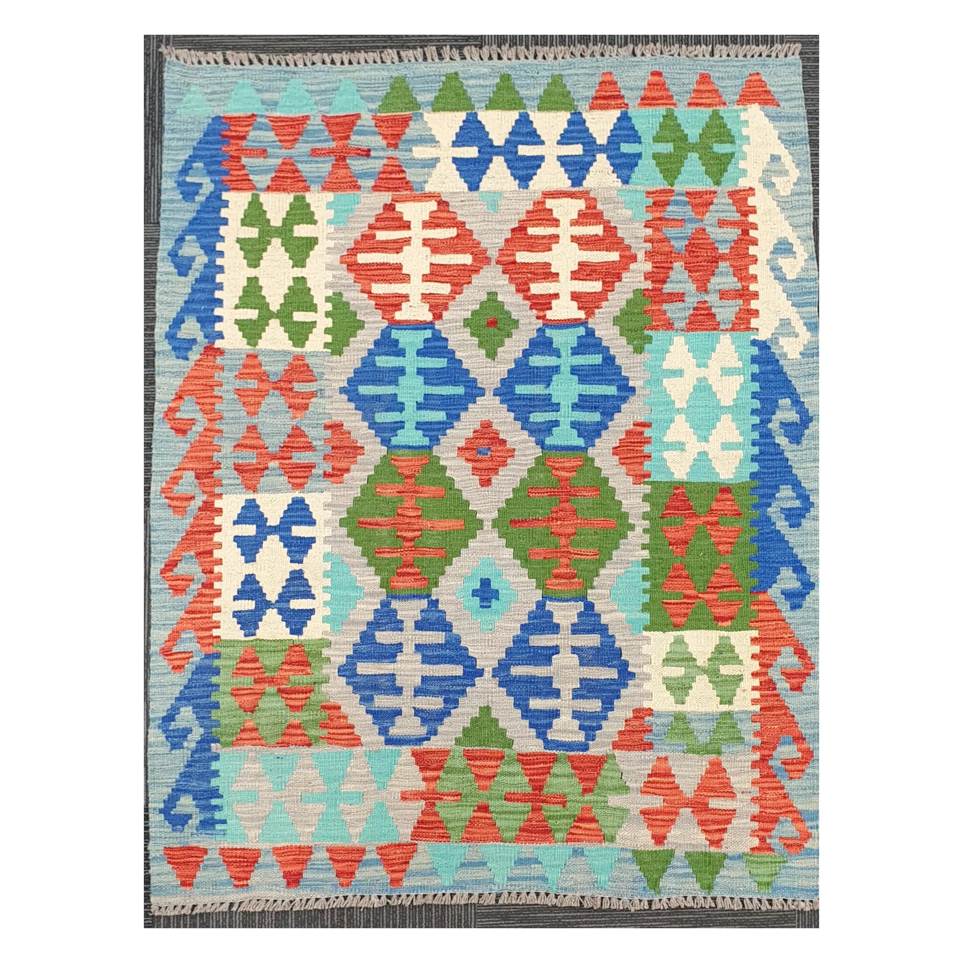 Full view of Afghan Chobi Kilim rug with blue diamond lattice on an ivory ground, 144 x 105 cm