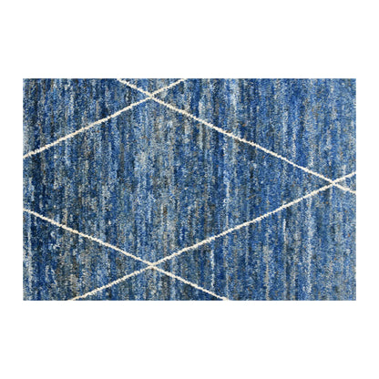 Field detail of blue Moroccan rug showing an ivory diamond lattice across cobalt, blue-grey and muted teal striations