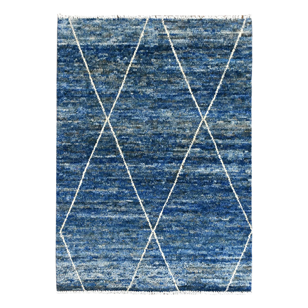 Full view of blue Moroccan wool rug with an open ivory diamond lattice across a variegated blue field, 180 x 140 cm
