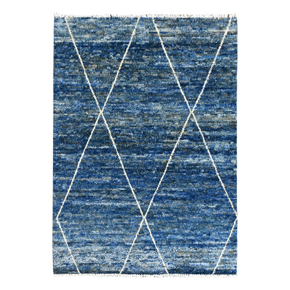 Full view of blue Moroccan wool rug with an open ivory diamond lattice across a variegated blue field, 180 x 140 cm
