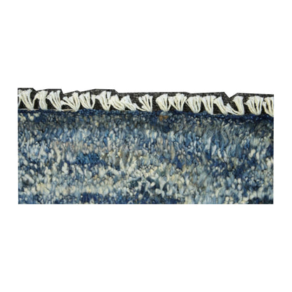 Edge and fringe detail of blue Moroccan wool rug, 180 x 140 cm
