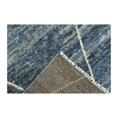 Folded corner detail of Moroccan wool rug showing pile and reverse weave, 180 x 140 cm