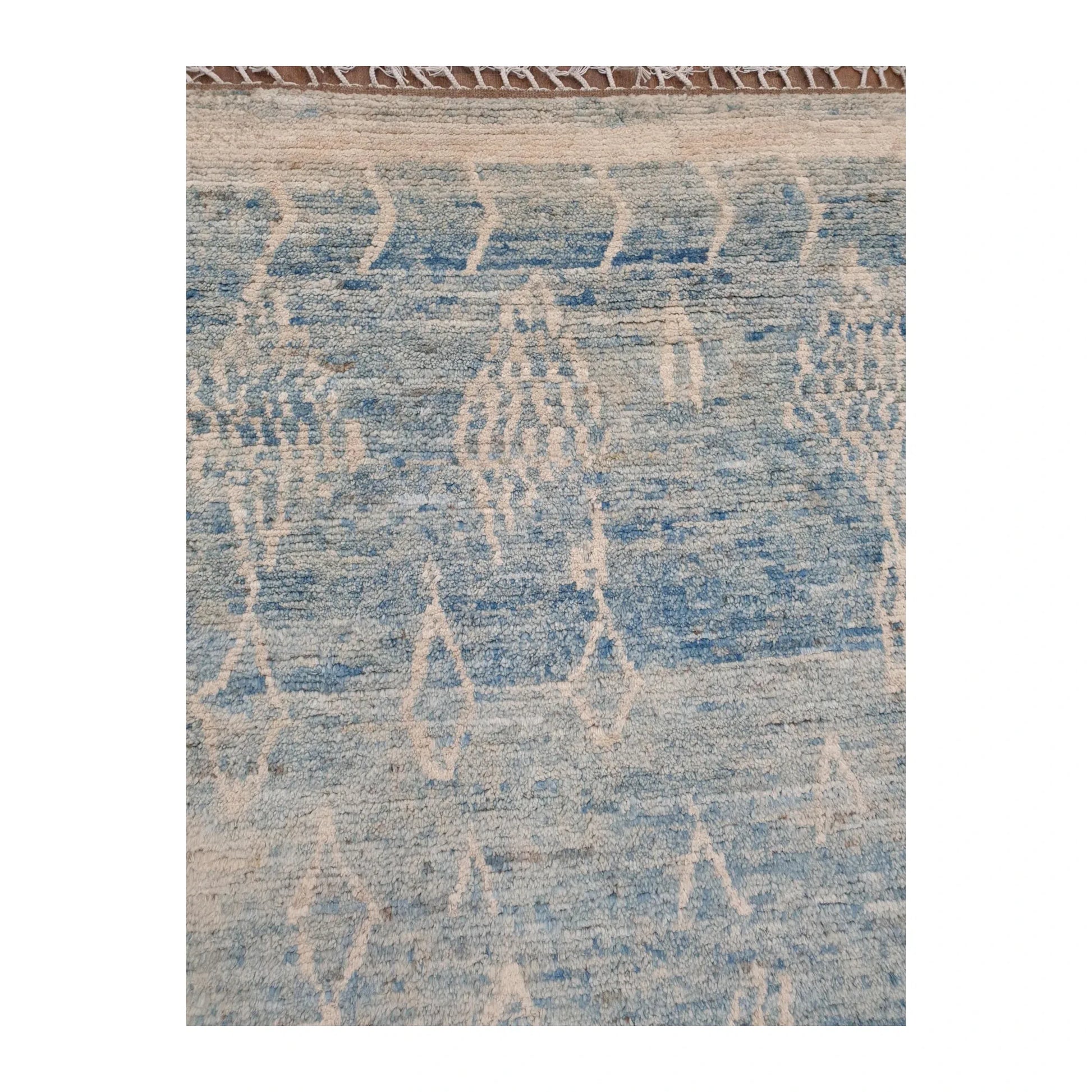 Motif detail of Moroccan wool rug with blue field and ivory pattern, 240 x 156 cm