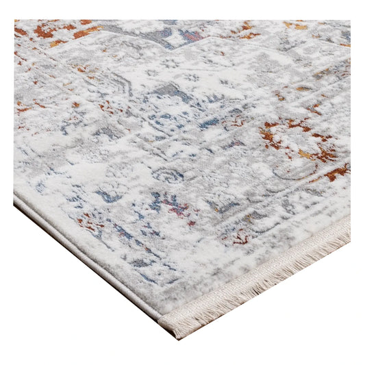Corner texture detail of Bohemian Paradise grey multi rug showing soft vintage-style pattern