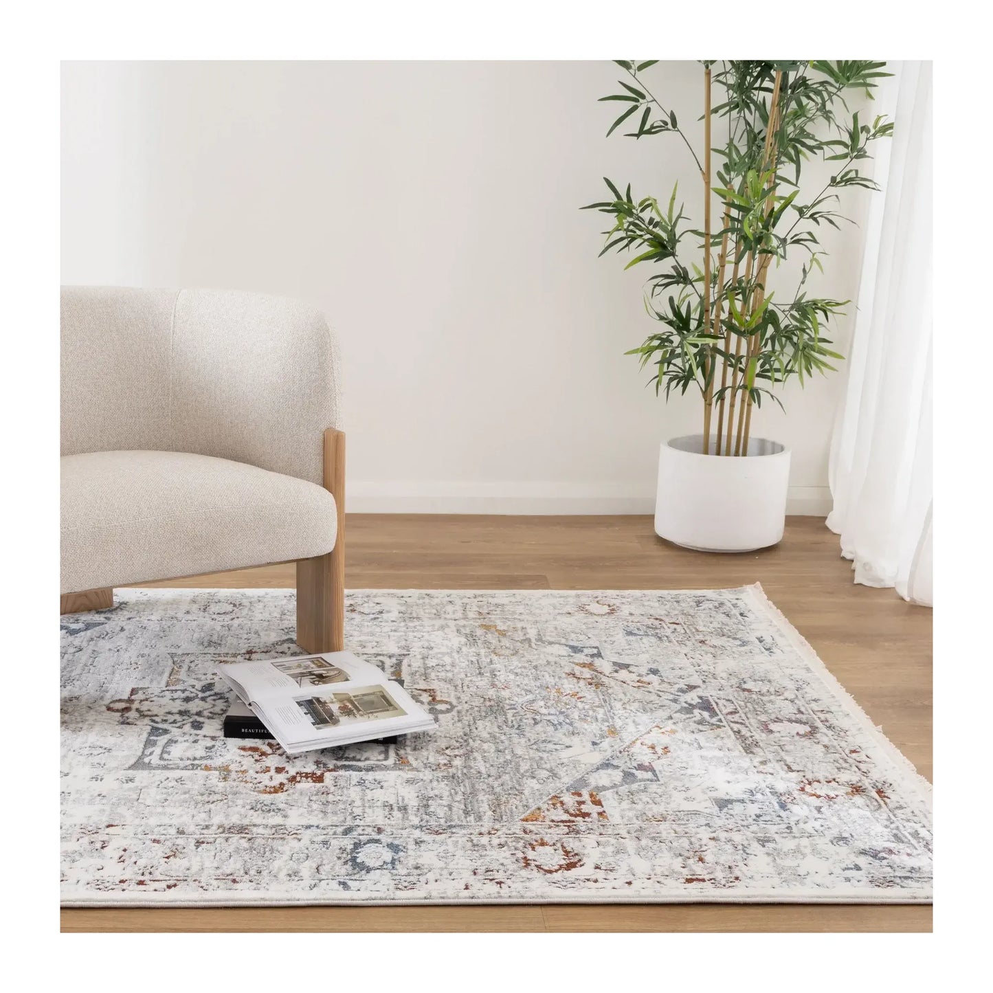 Bohemian Paradise classic vintage grey multi rug styled in a light neutral interior