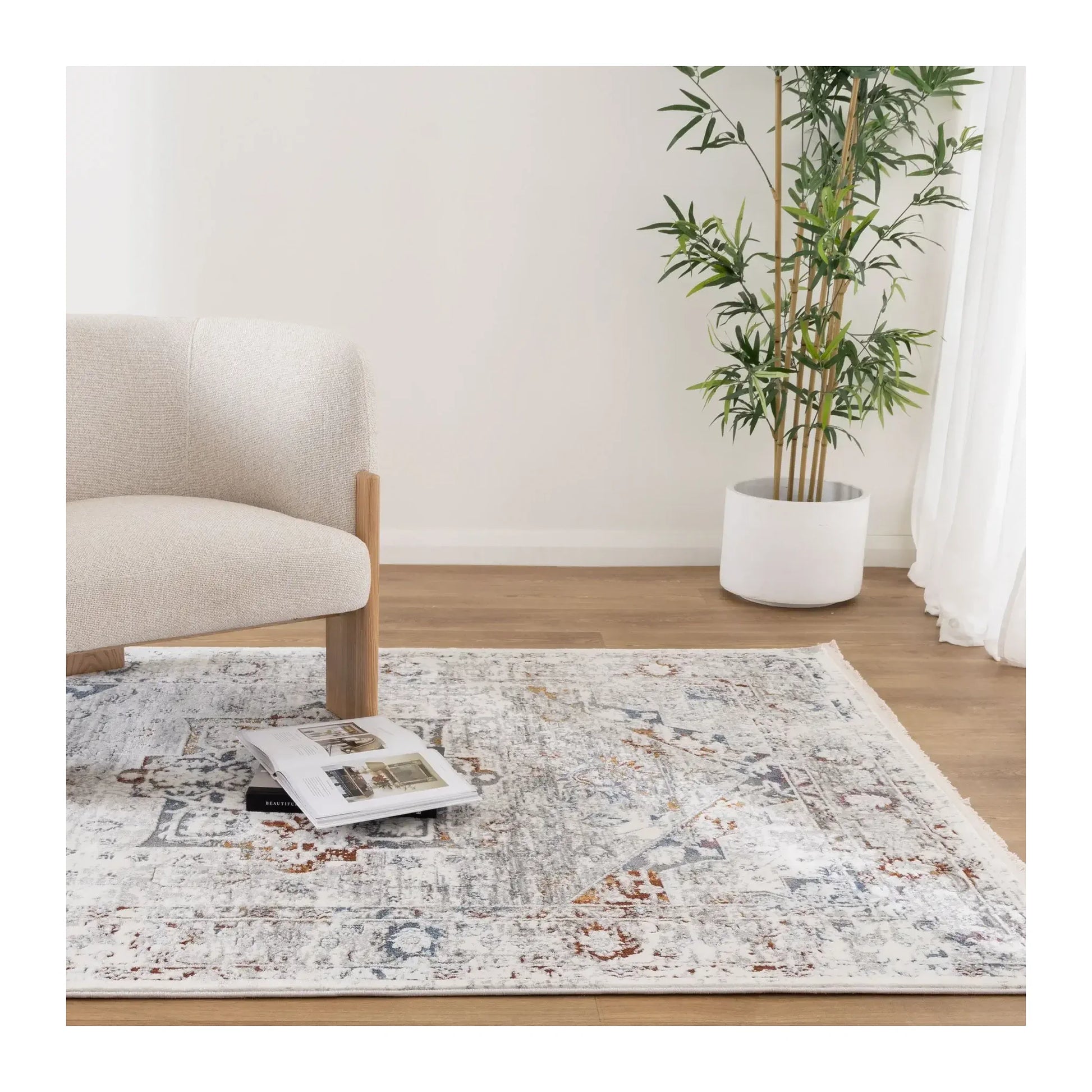 Bohemian Paradise classic vintage grey multi rug styled in a light neutral interior