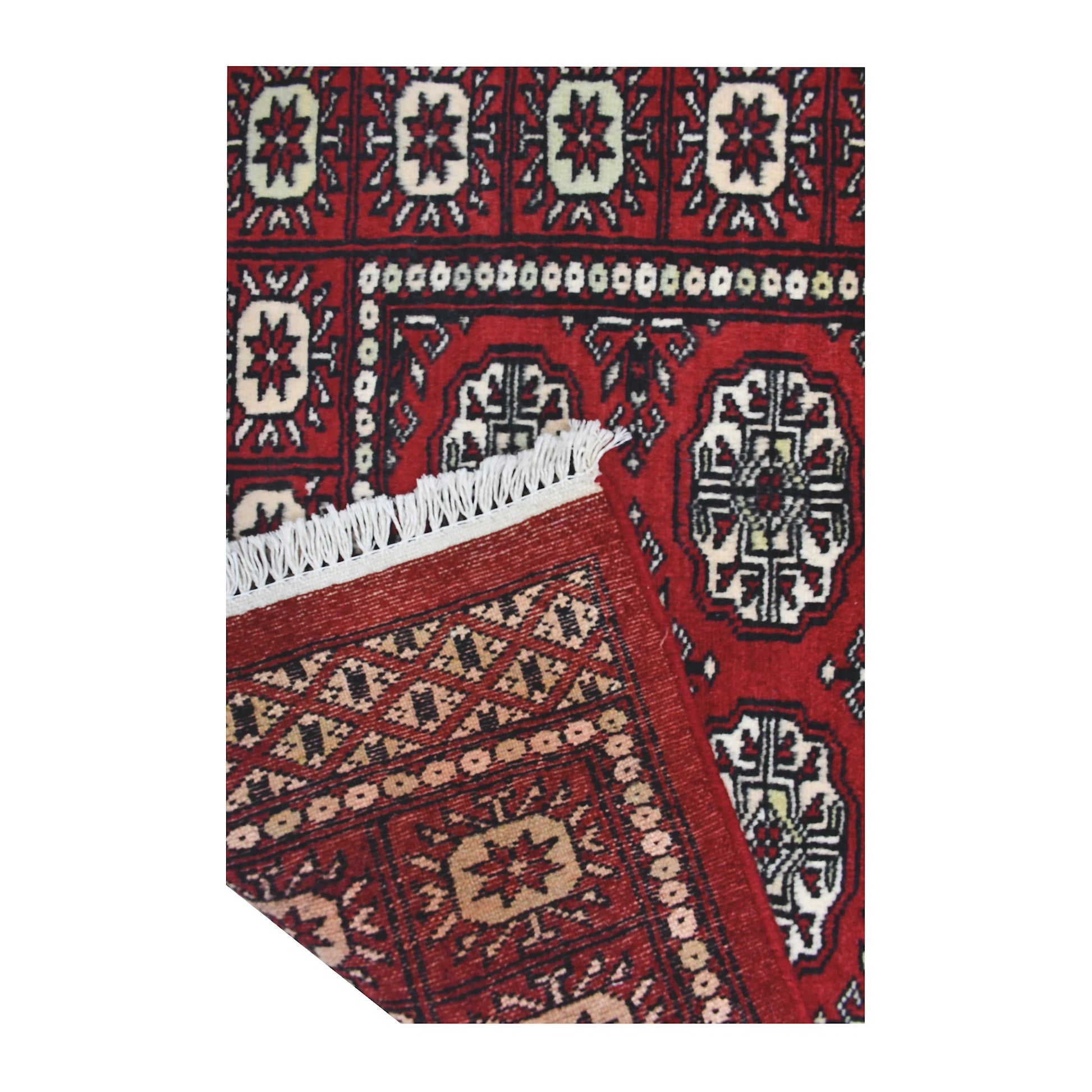 Folded corner reverse-weave detail of Bokhara hand-knotted wool rug showing the back structure, pattern and weave