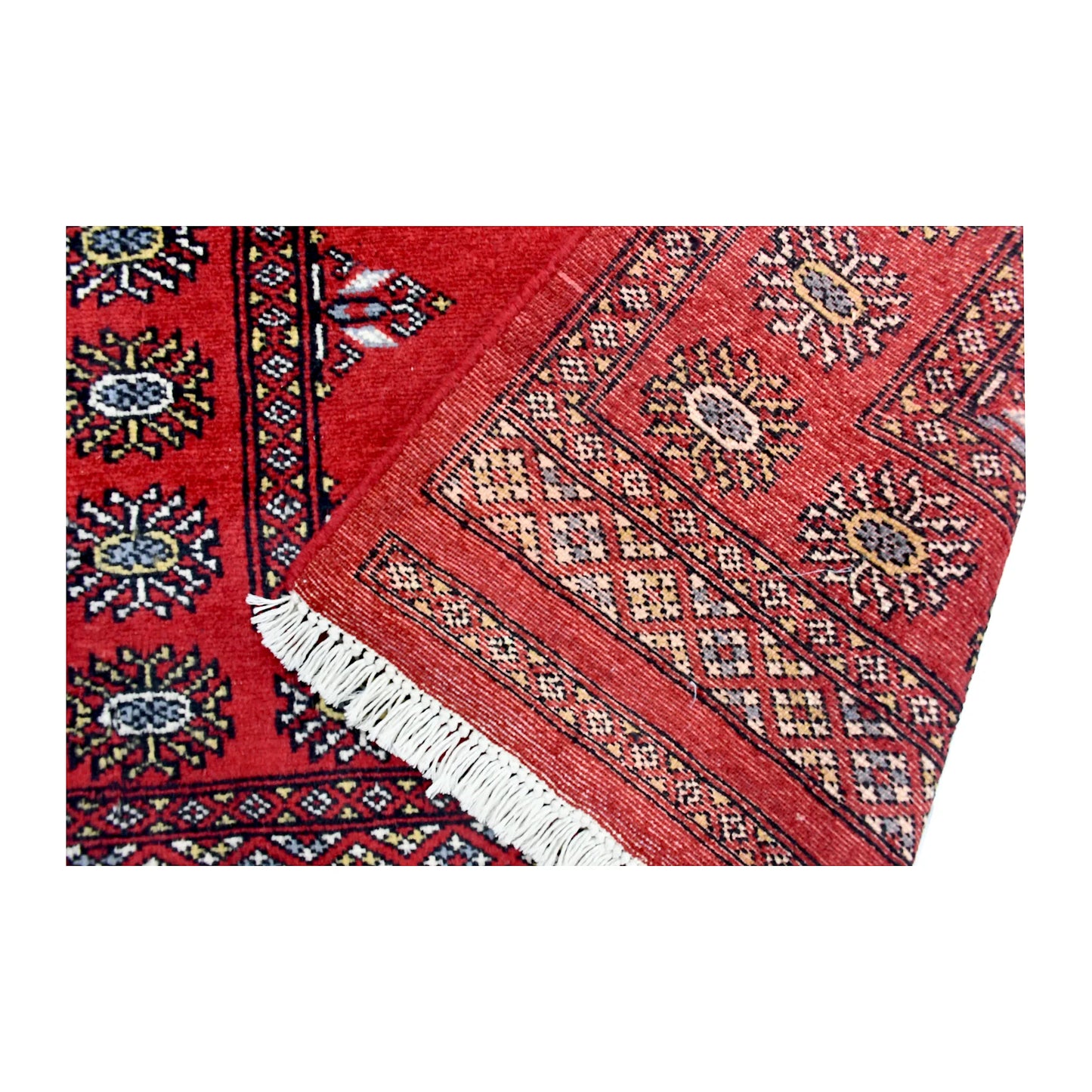 Reverse-weave detail of Bokhara hand-knotted wool rug showing back structure, pattern and weave