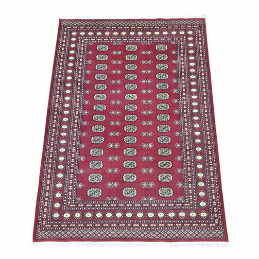 Bokhara hand-knotted wool rug 247 x 173 cm angled view