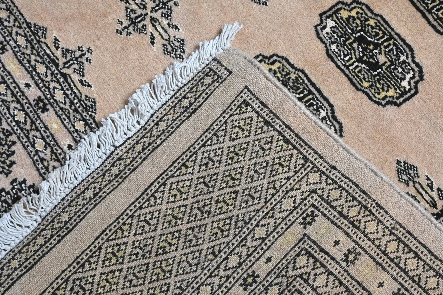 Bokhara hand-knotted wool rug 309 x 203 cm back view