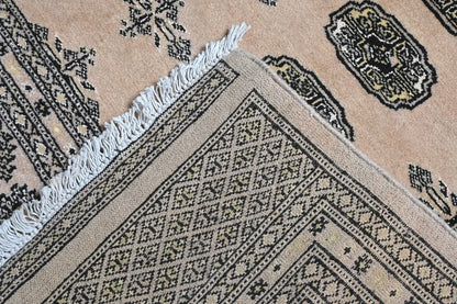 Bokhara hand-knotted wool rug 309 x 203 cm back view